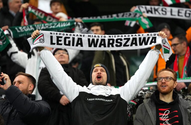 UEFA closes Legia Warsaw stadium for one game after fan incidents including giant expletive banner