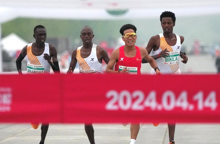 Beijing half marathon results under investigation after runners appear to hand win to Chinese star, He Jie