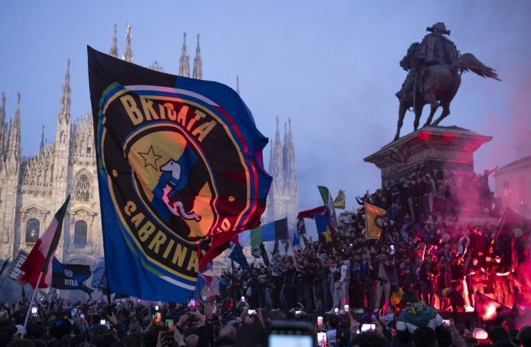 Inter celebrates Serie A title with an open-air bus parade; Abraham secures Roma a draw at Napoli