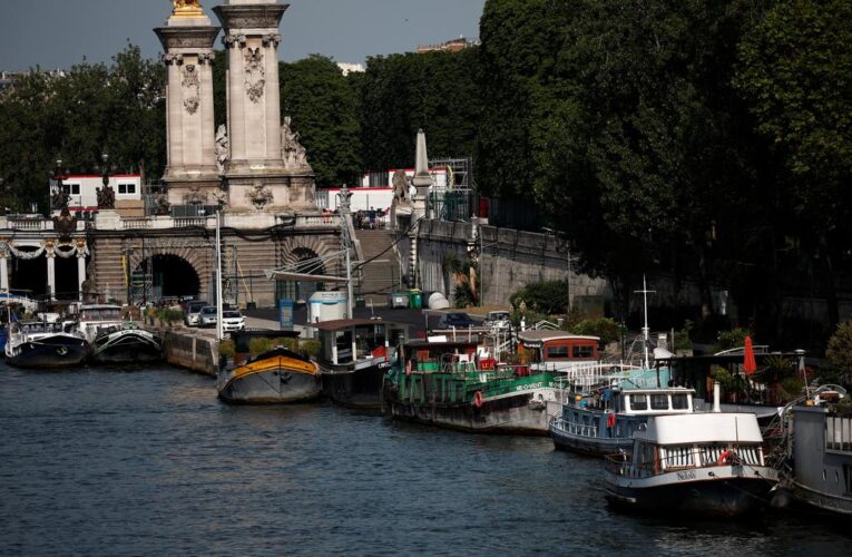Paris Olympics organizers say swimming events still set for the cleaned-up Seine after heavy rains