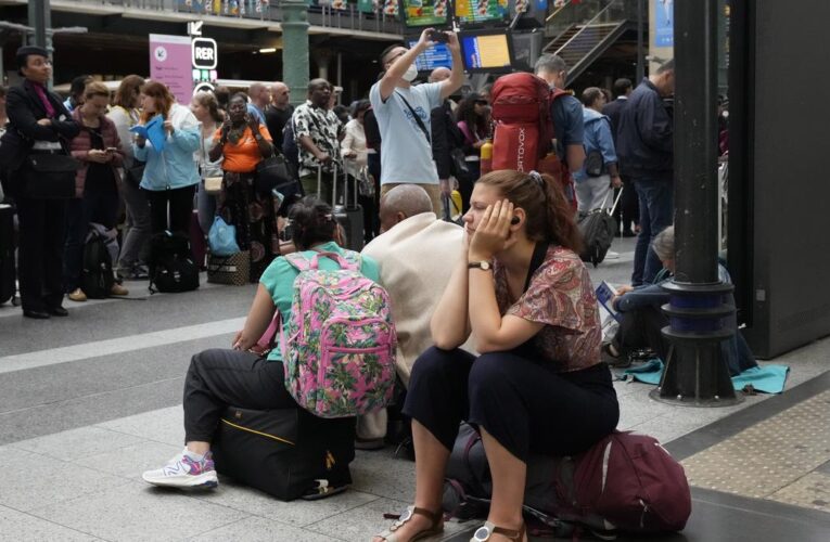 Paris Olympics 2024 off to rough start, with sabotaged trains and weather dampening mood before opening