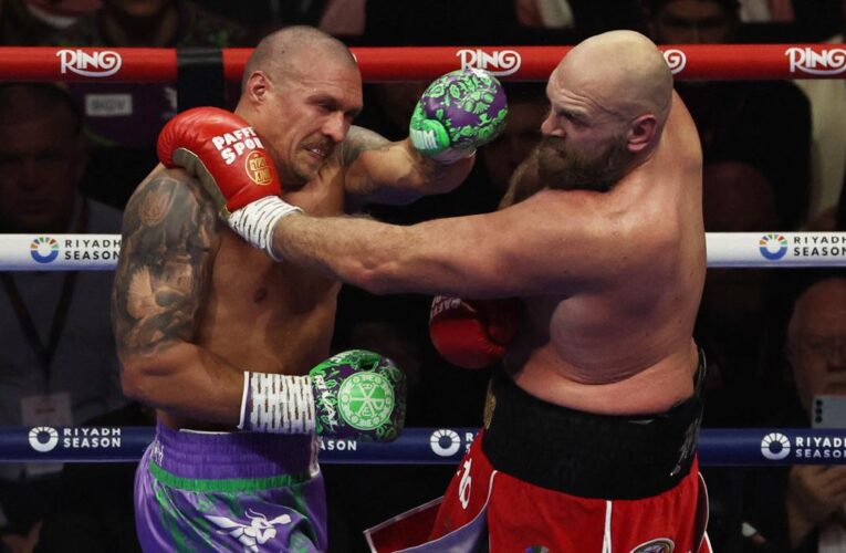 Ukraine’s Usyk outpoints Fury to retain world heavyweight crowns
